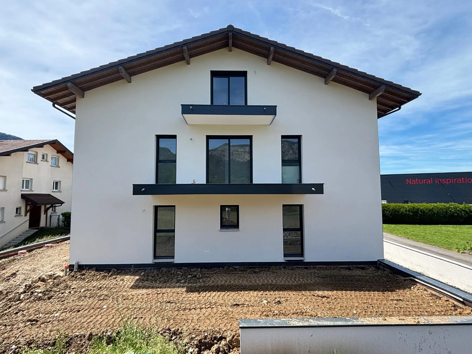 Appartement T2 de 55m² avec balcon à Saint-Pierre-en-Faucigny, résidence moderne 