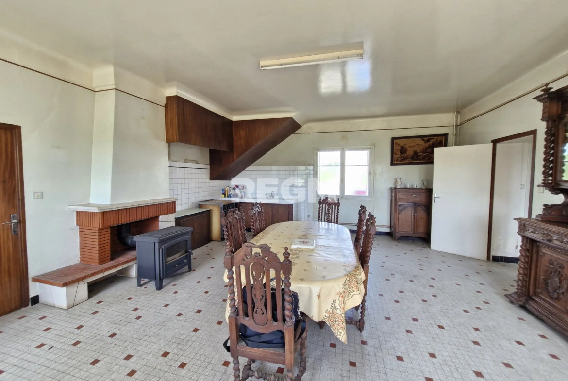 Maison à rénover proche de Tournay avec potentiel locatif et vue dégagée 