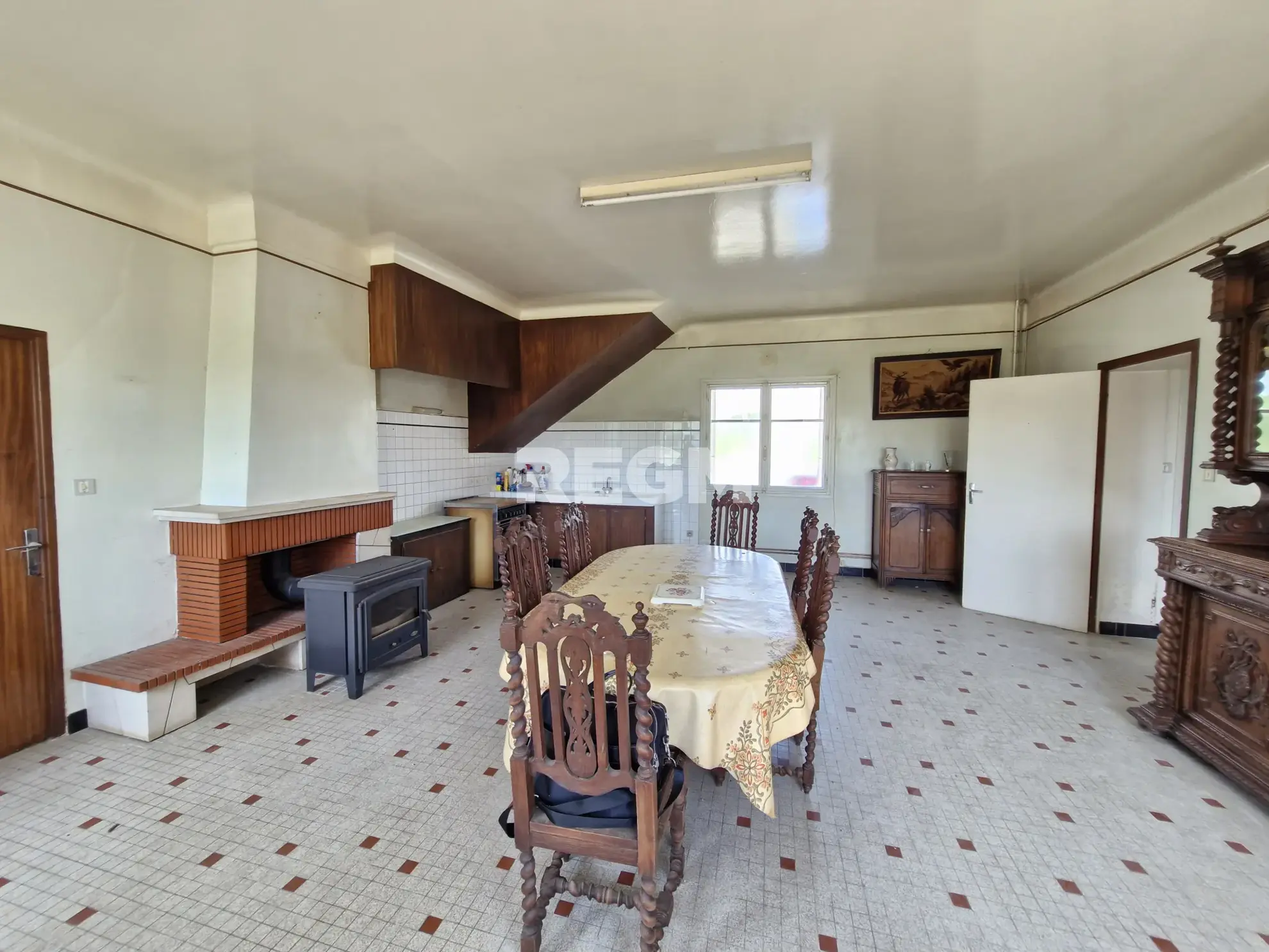 Maison à rénover proche de Tournay avec potentiel locatif et vue dégagée 