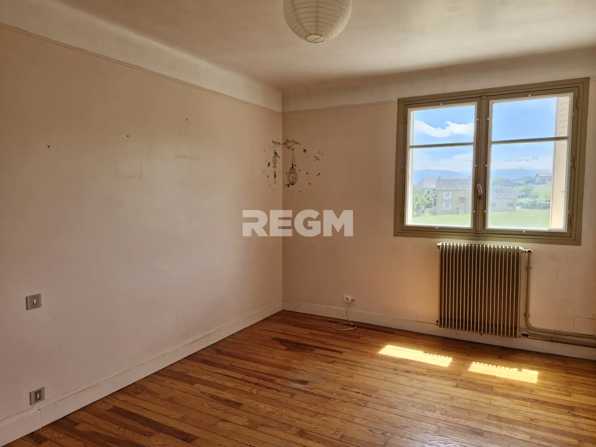 Maison à rénover proche de Tournay avec potentiel locatif et vue dégagée 
