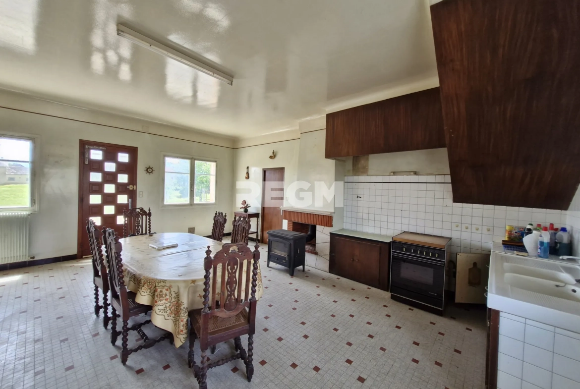 Maison à rénover proche de Tournay avec potentiel locatif et vue dégagée 