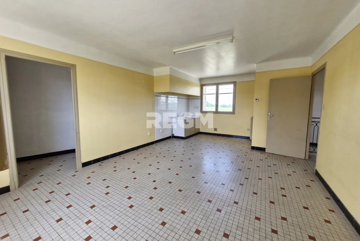 Maison à rénover proche de Tournay avec potentiel locatif et vue dégagée 