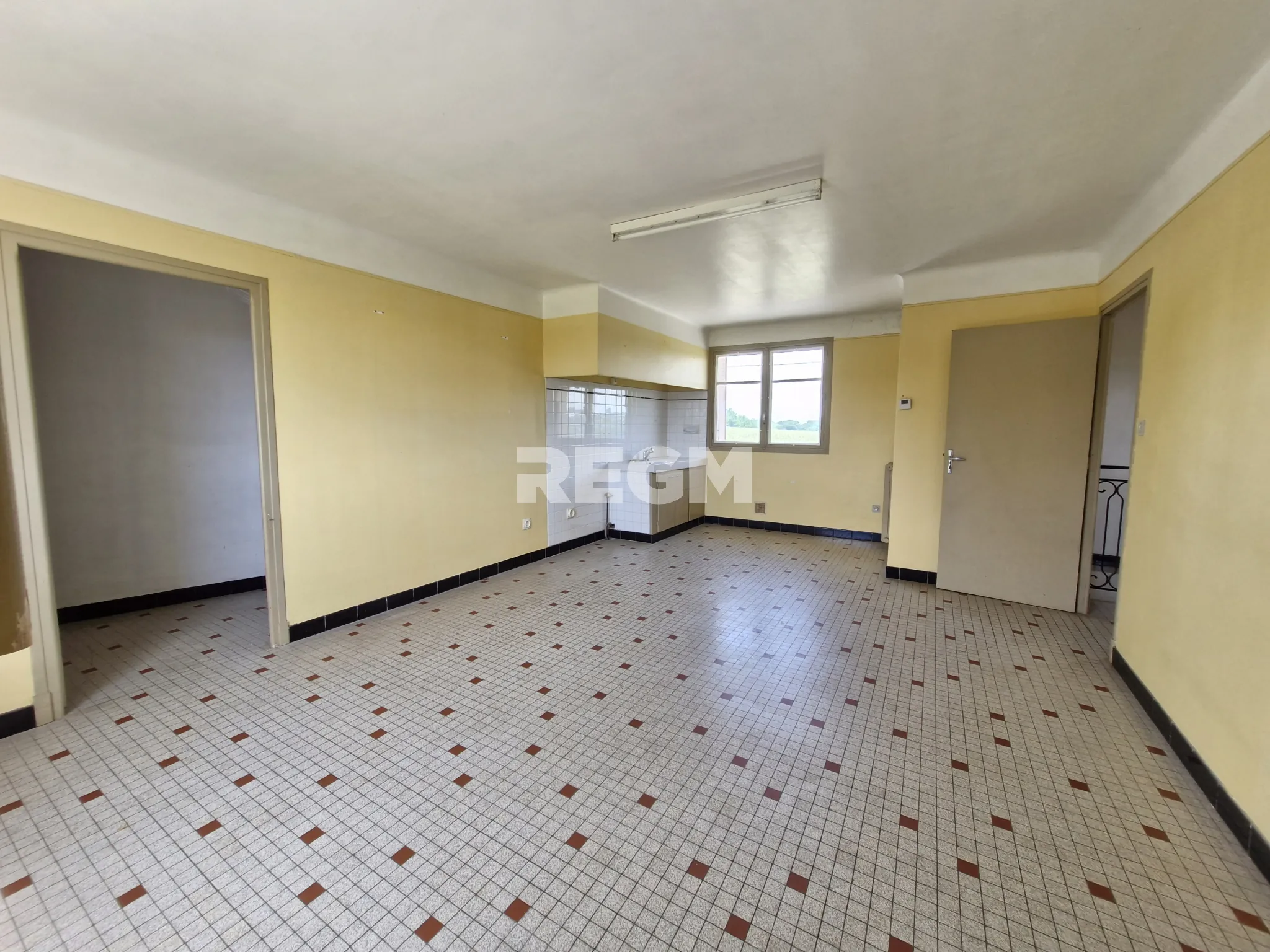 Maison à rénover proche de Tournay avec potentiel locatif et vue dégagée 