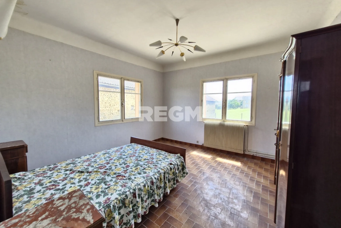Maison à rénover proche de Tournay avec potentiel locatif et vue dégagée 