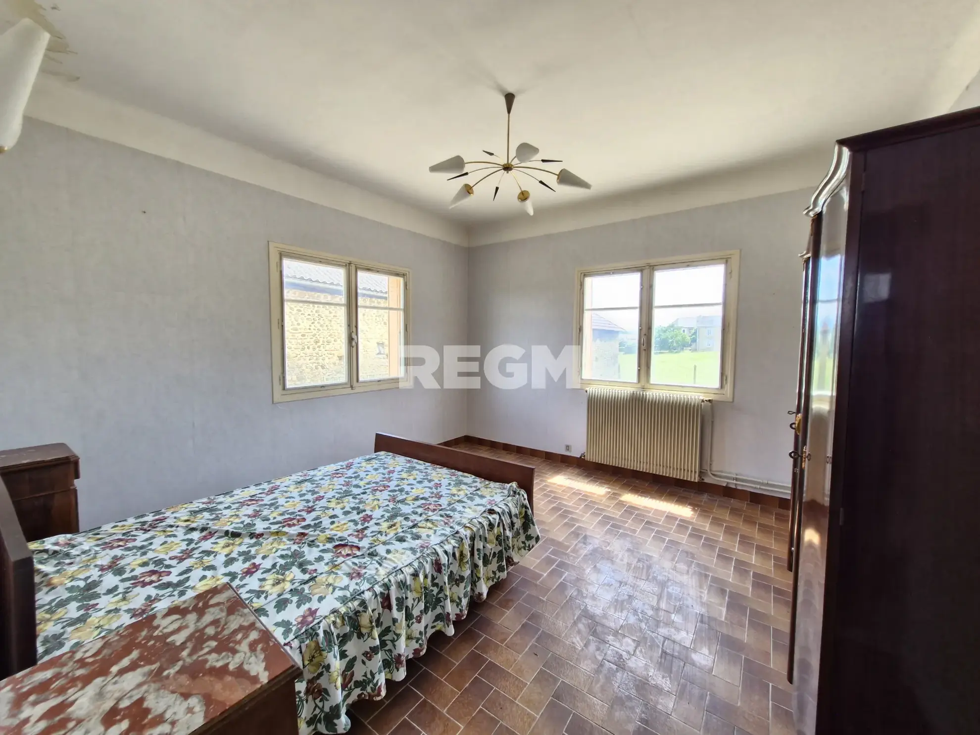 Maison à rénover proche de Tournay avec potentiel locatif et vue dégagée 