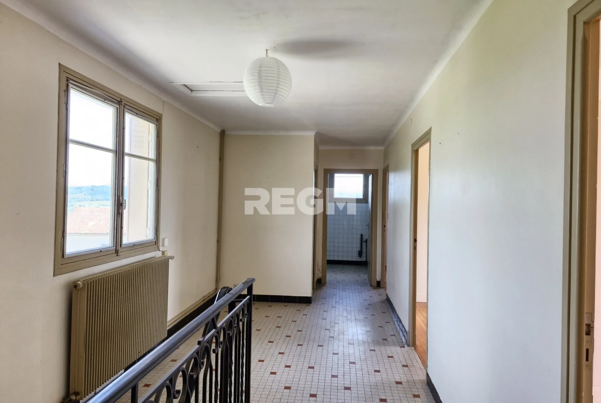 Maison à rénover proche de Tournay avec potentiel locatif et vue dégagée 