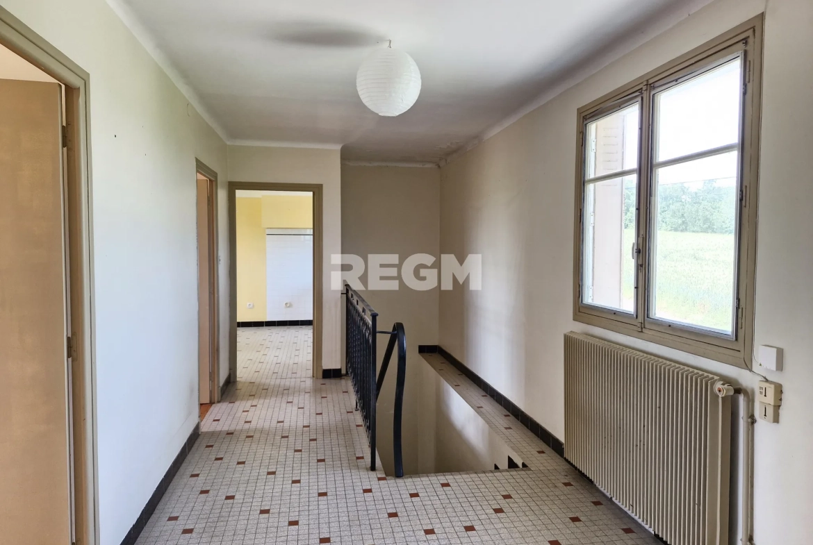 Maison à rénover proche de Tournay avec potentiel locatif et vue dégagée 
