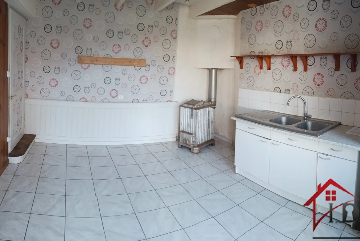 À vendre à Gevigney-et-Mercey : maison de 58m² avec dépendances et jardin, opportunité d'investissement 