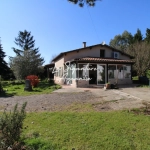 Maison de plain-pied à Laugnac avec 4 chambres et jardin arboré