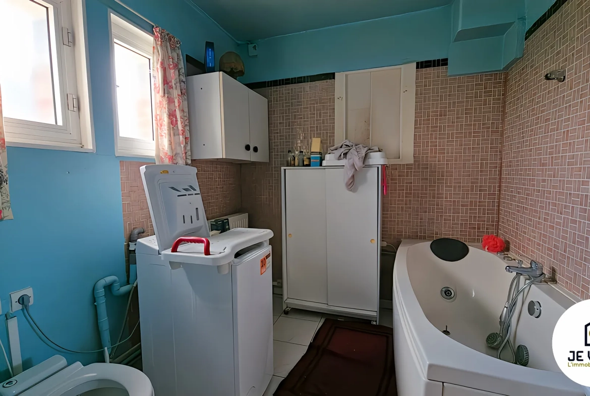 Maison individuelle avec grand jardin à Aubers, potentiel de rénovation dans un environnement verdoyant 