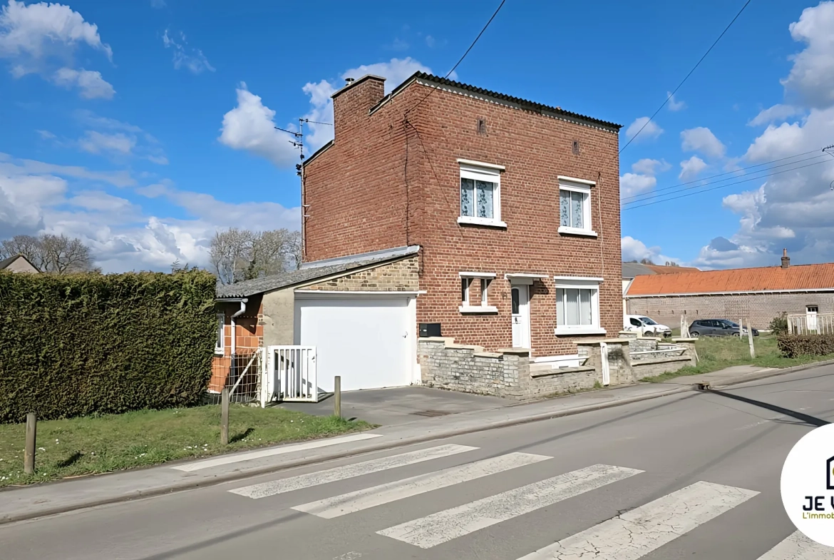 Maison individuelle avec grand jardin à Aubers, potentiel de rénovation dans un environnement verdoyant 