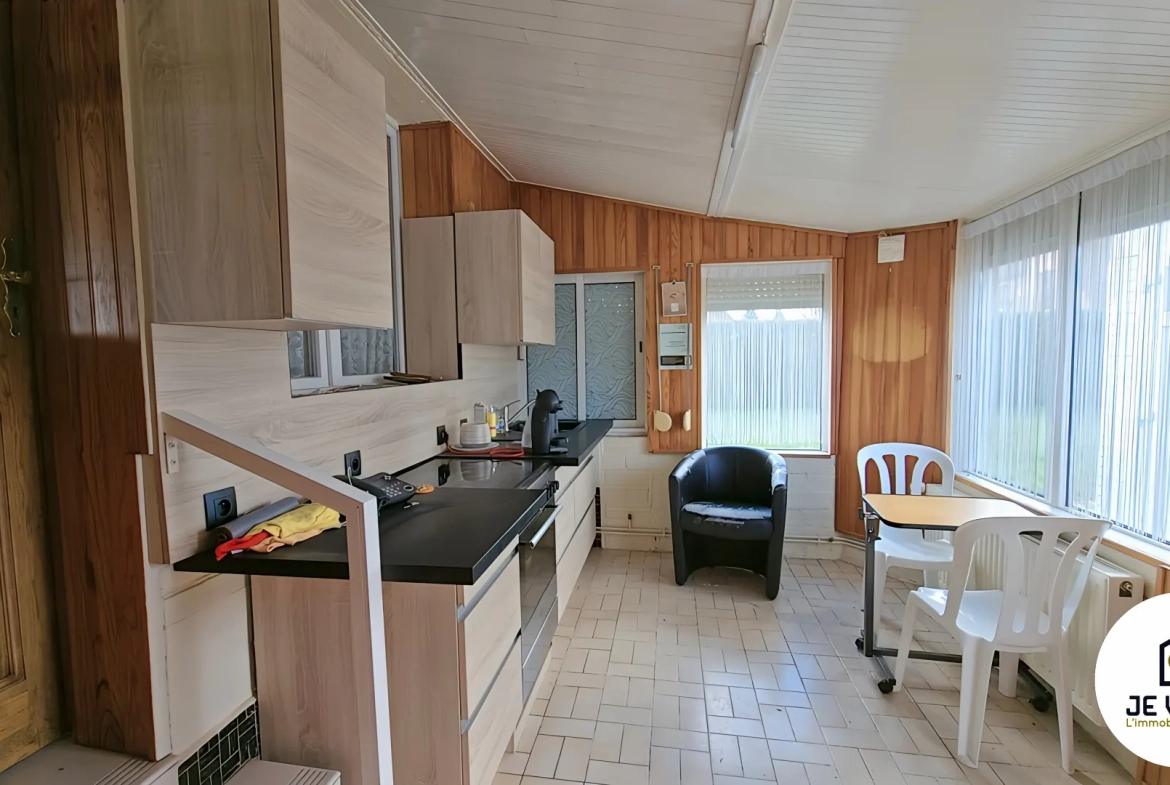 Maison individuelle avec grand jardin à Aubers, potentiel de rénovation dans un environnement verdoyant 