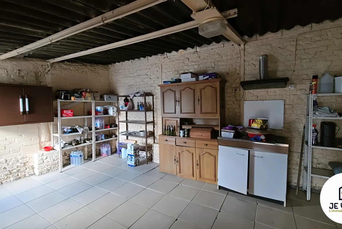 Maison individuelle avec grand jardin à Aubers, potentiel de rénovation dans un environnement verdoyant 