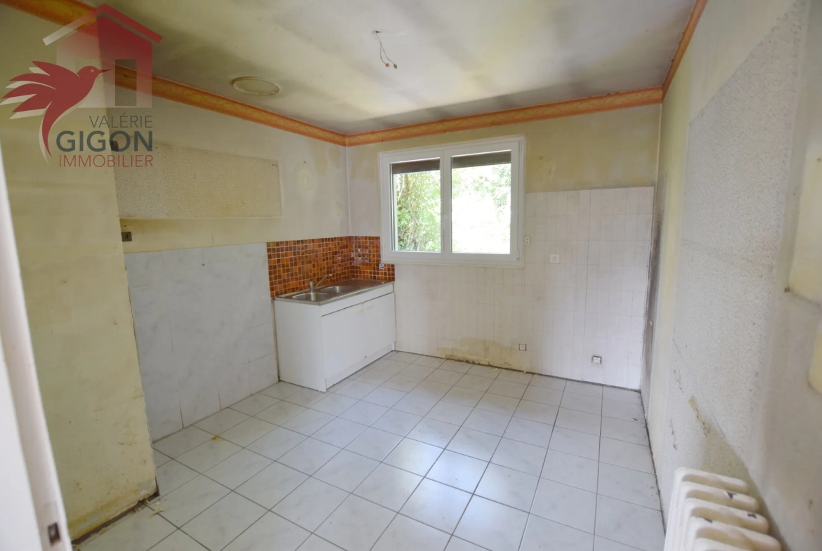 Maison de plain-pied à Audincourt avec potentiel de rénovation et jardin 