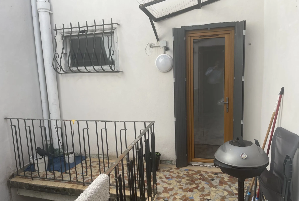 Appartement 91 m2 avec terrasse et cachet authentique au cœur de Carcassonne 
