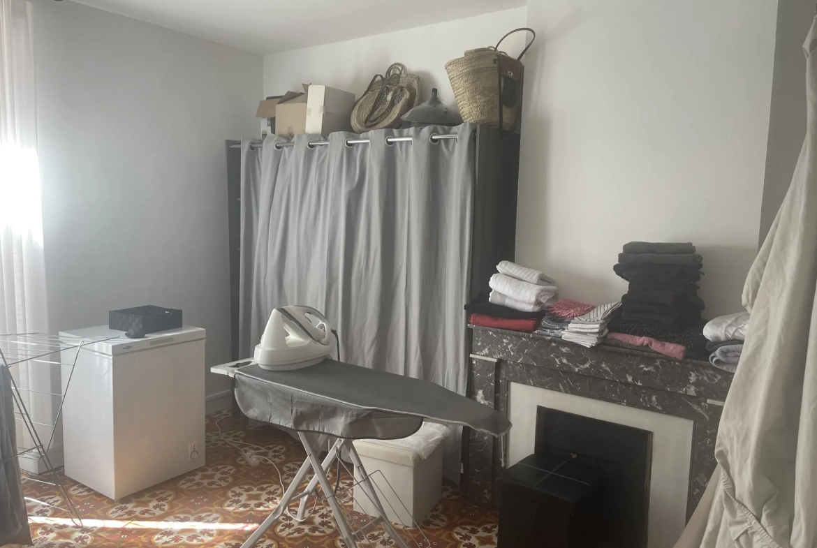 Appartement 91 m2 avec terrasse et cachet authentique au cœur de Carcassonne 