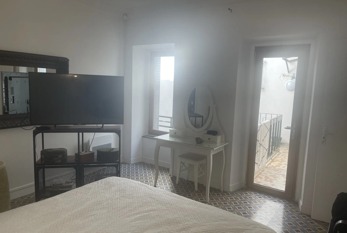 Appartement 91 m2 avec terrasse et cachet authentique au cœur de Carcassonne 