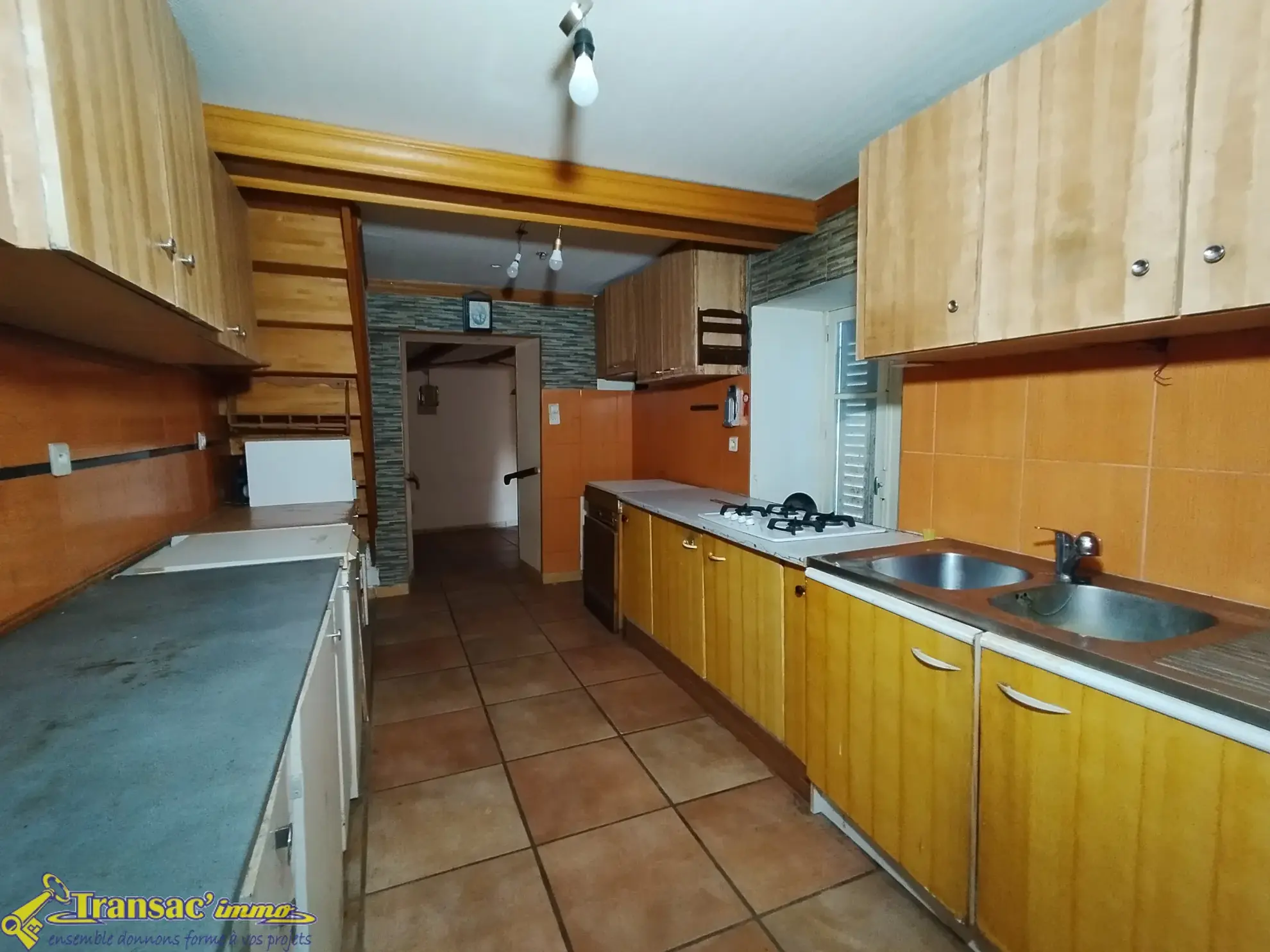 Maison de village à rénover de 60 m² avec parcelle de 2821 m² à Orléat 