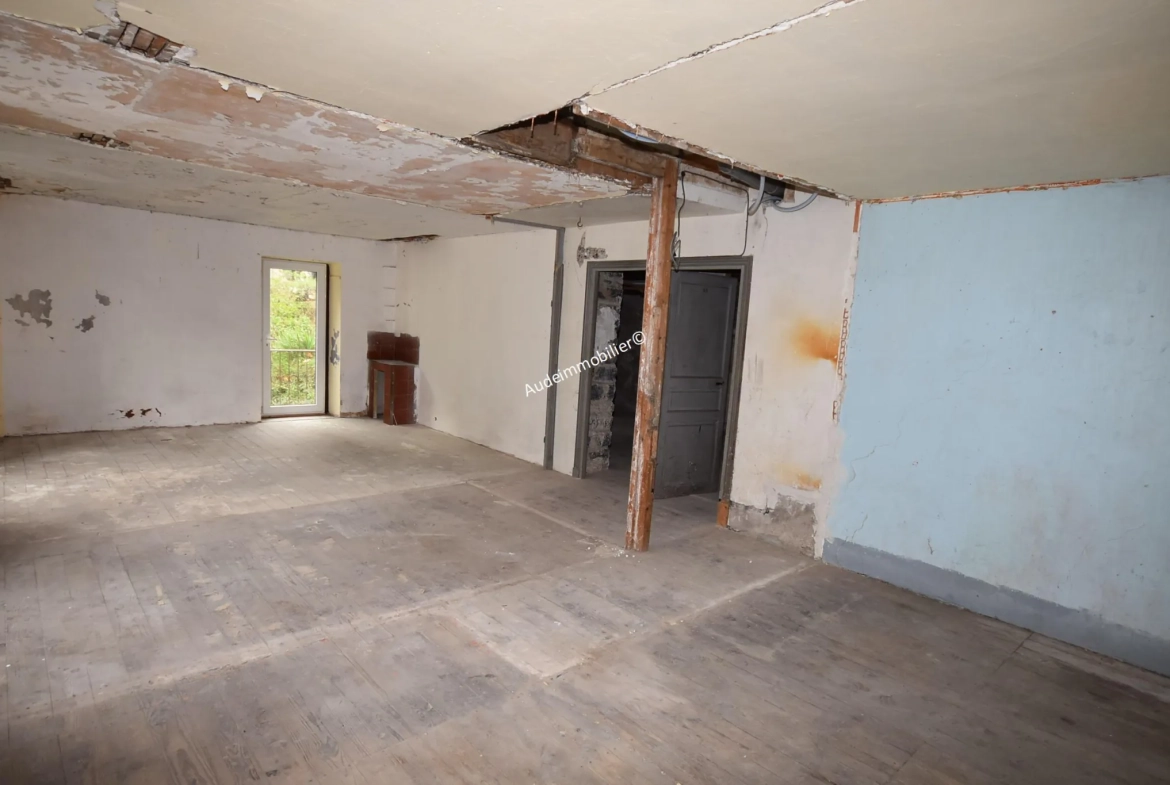 Grande maison modulable de 437 m² avec jardin et garages à Axat 