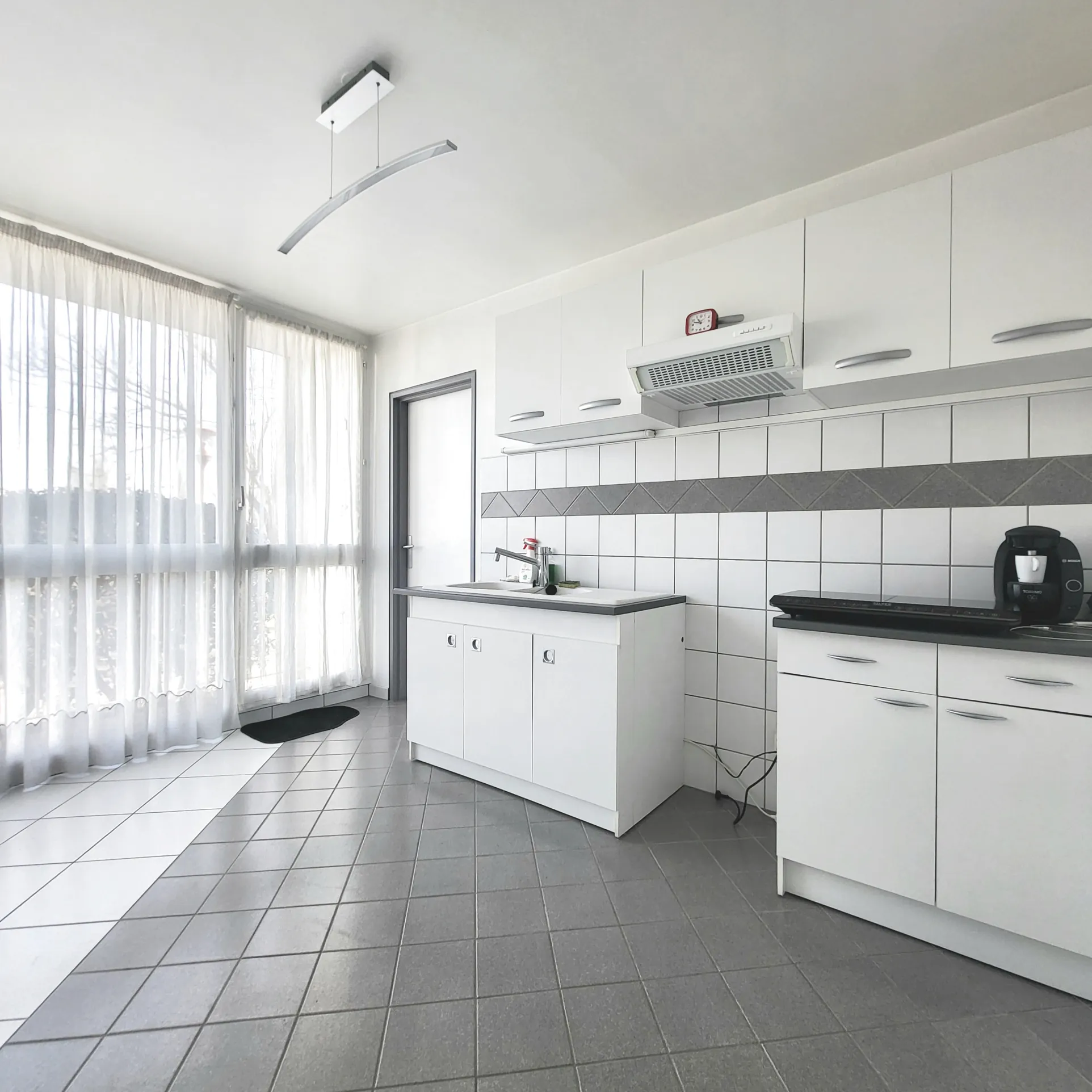 Appartement T2 lumineux avec bureau, balcon et stationnement à Osny 