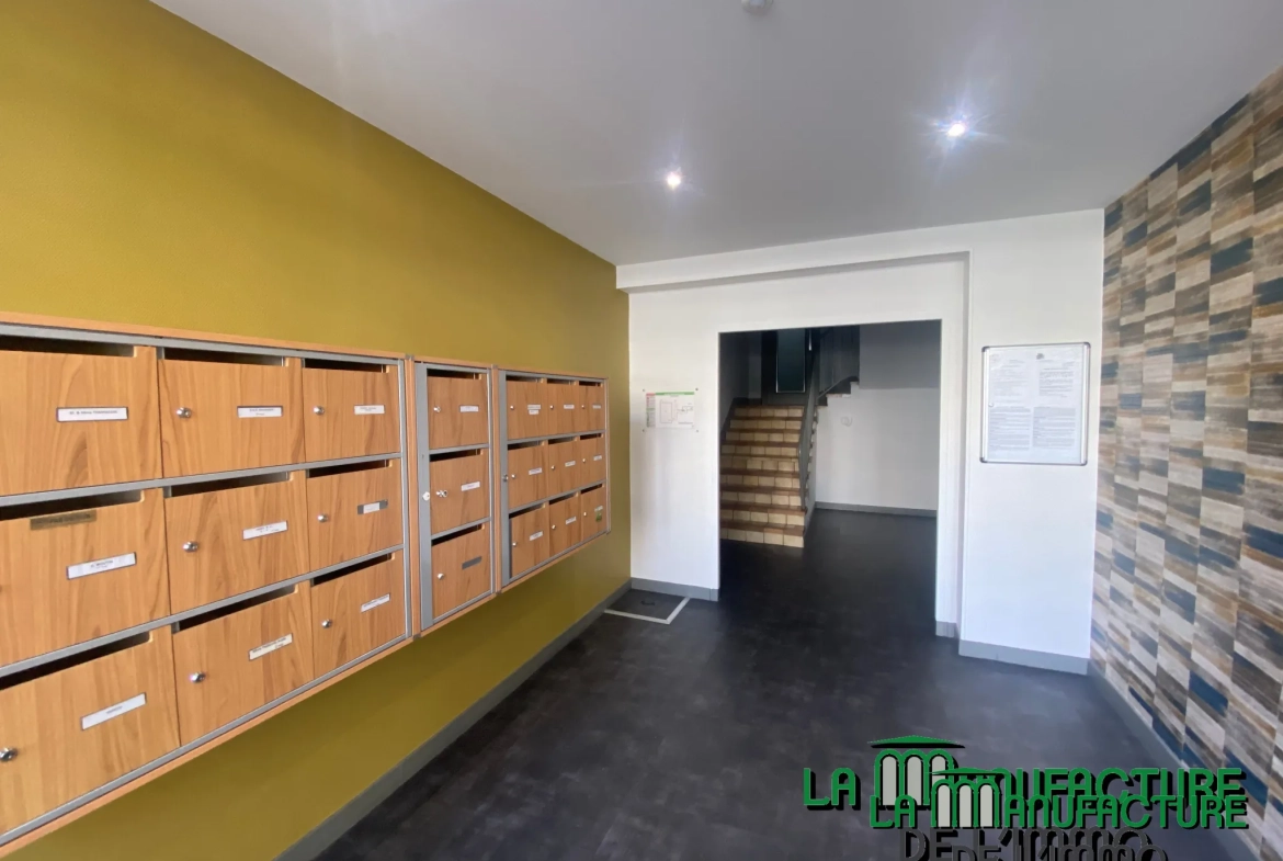 Appartement F3 lumineux à Saint-Étienne avec balcon, cave et parking collectif 