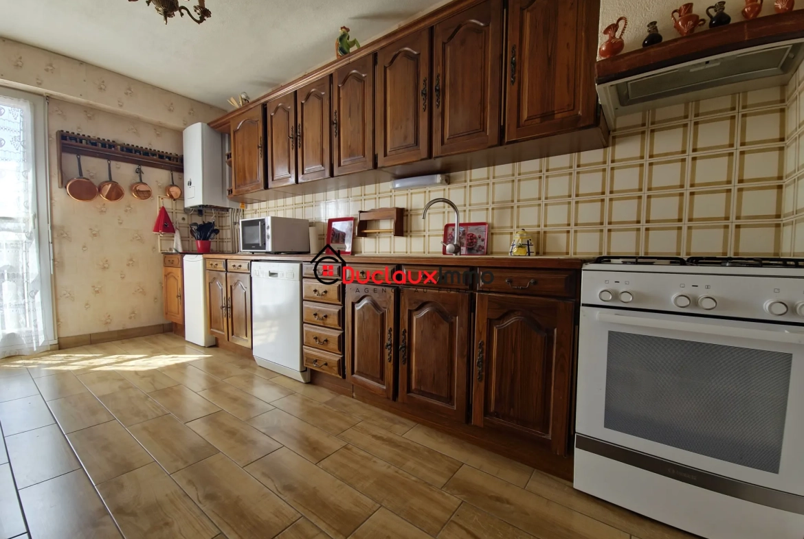 Maison 105 m² avec terrasse et jardin à Aurillac - Opportunité à saisir 