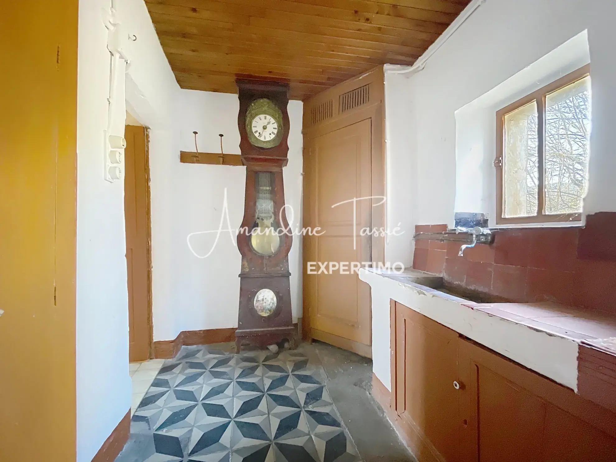 Maison de village à rénover avec garage et terrain à Labastide-Pradines 