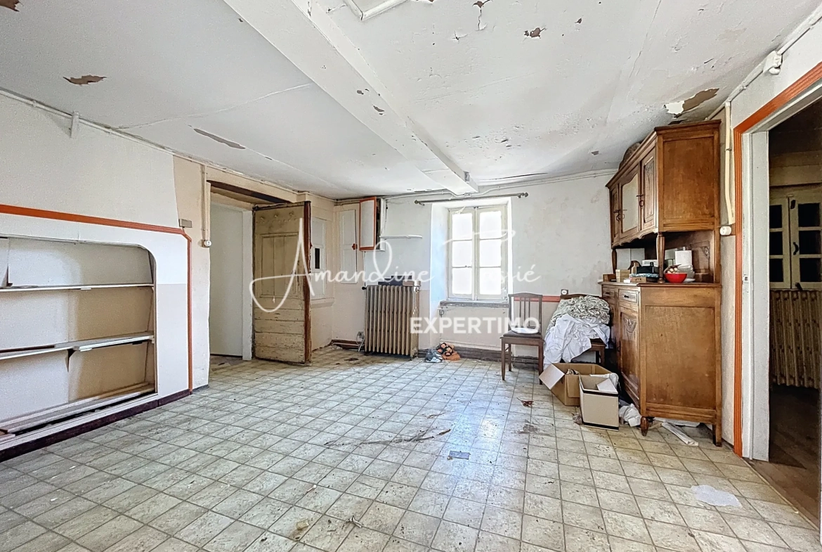 Maison de village à rénover avec garage et terrain à Labastide-Pradines 
