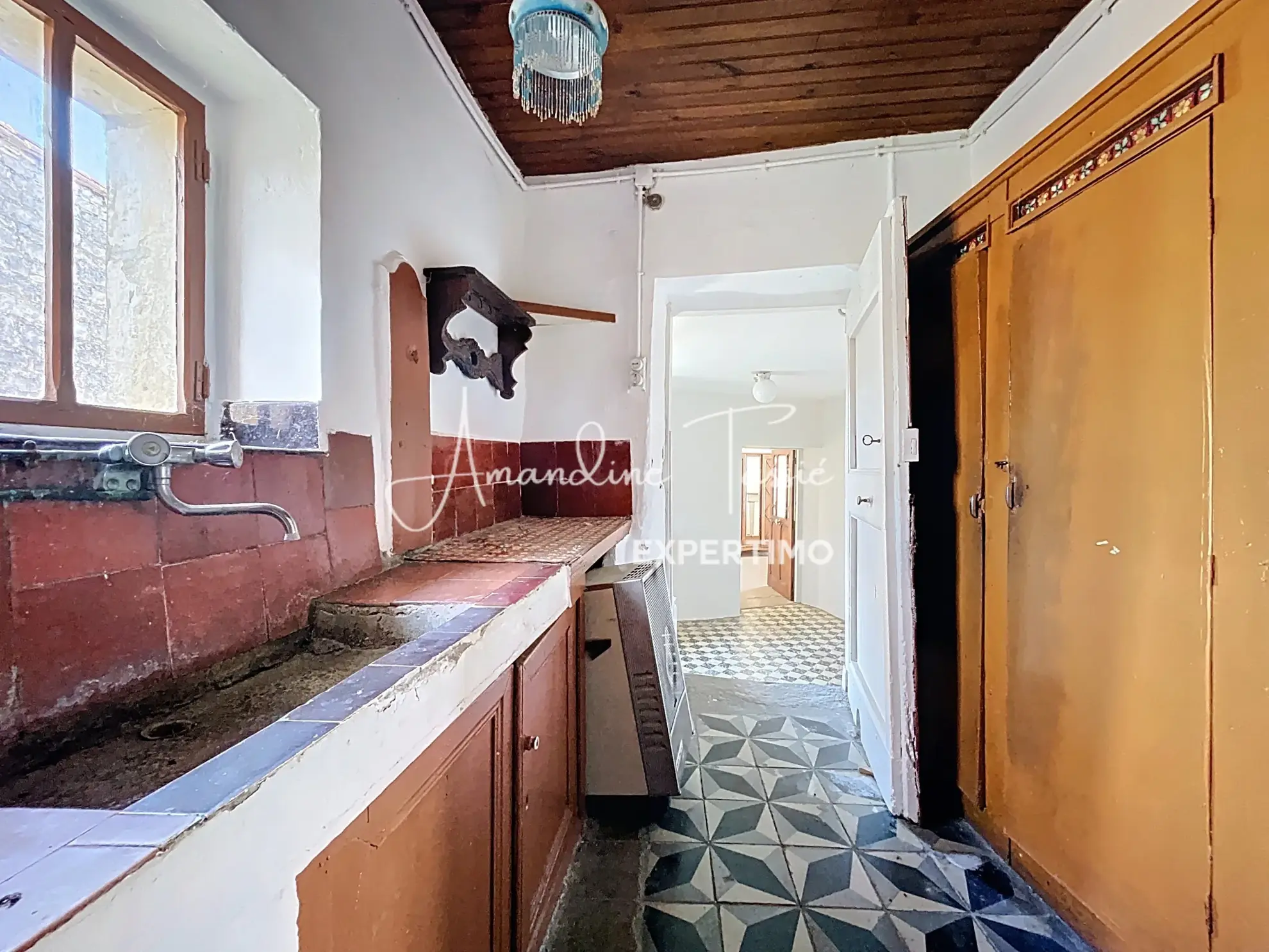 Maison de village à rénover avec garage et terrain à Labastide-Pradines 