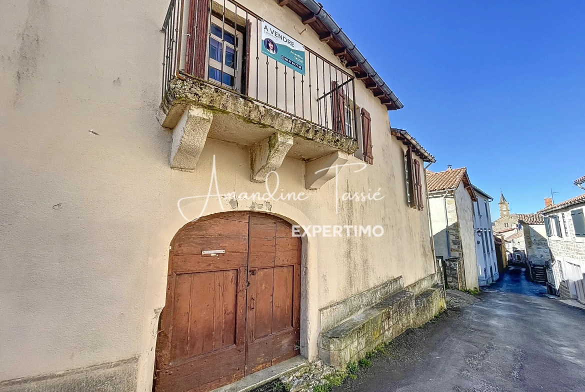 Maison de village à rénover avec garage et terrain à Labastide-Pradines 