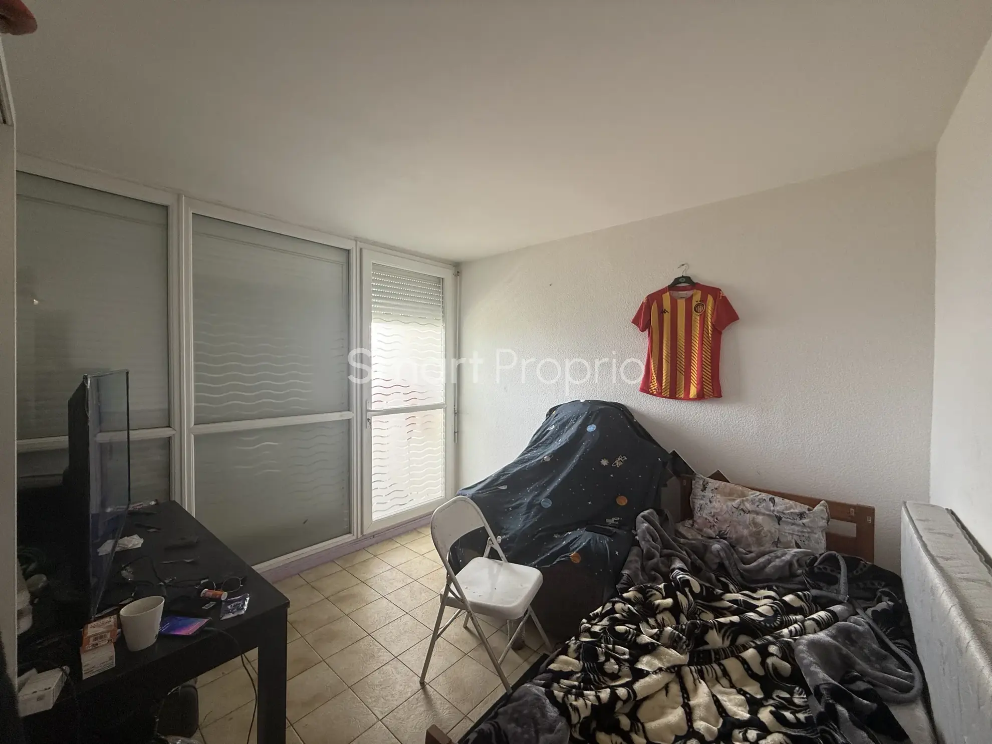 Appartement T4 à rénover à Carbon Blanc avec cave et parking 