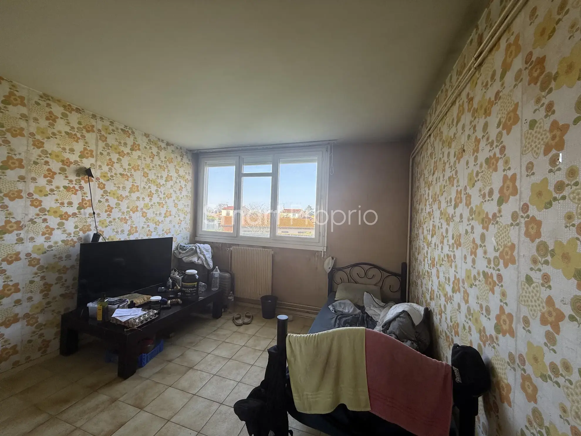 Appartement T4 à rénover à Carbon Blanc avec cave et parking 