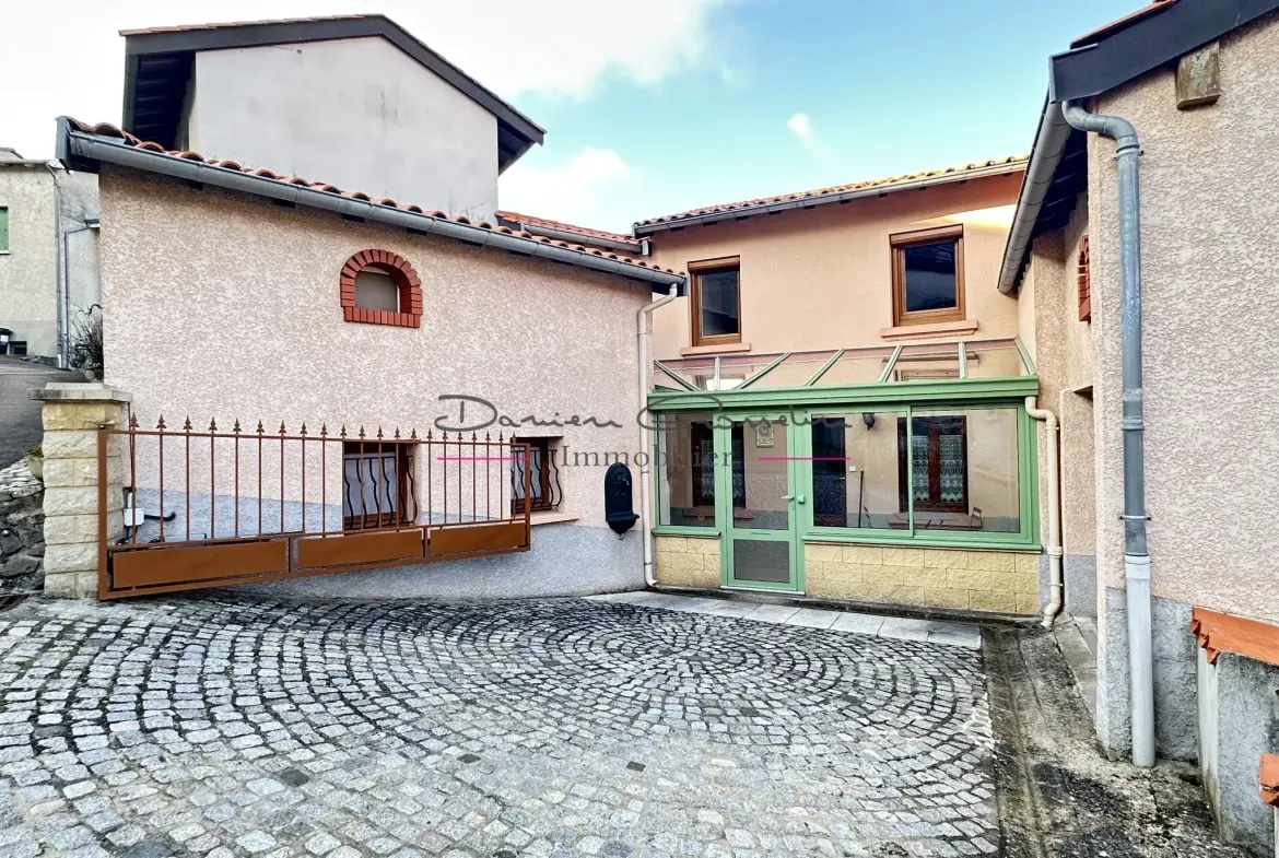 Maison de village avec jardin, garage et véranda à Sainte Colombe sur Gand 