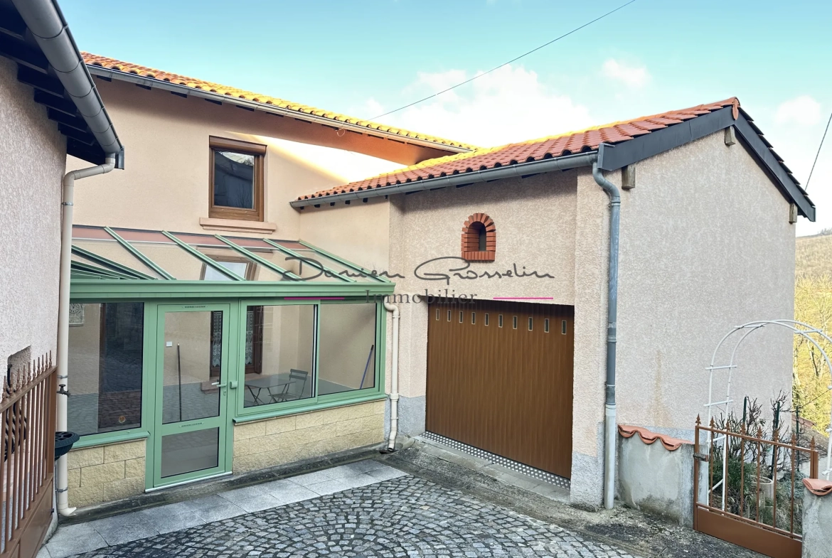 Maison de village avec jardin, garage et véranda à Sainte Colombe sur Gand 