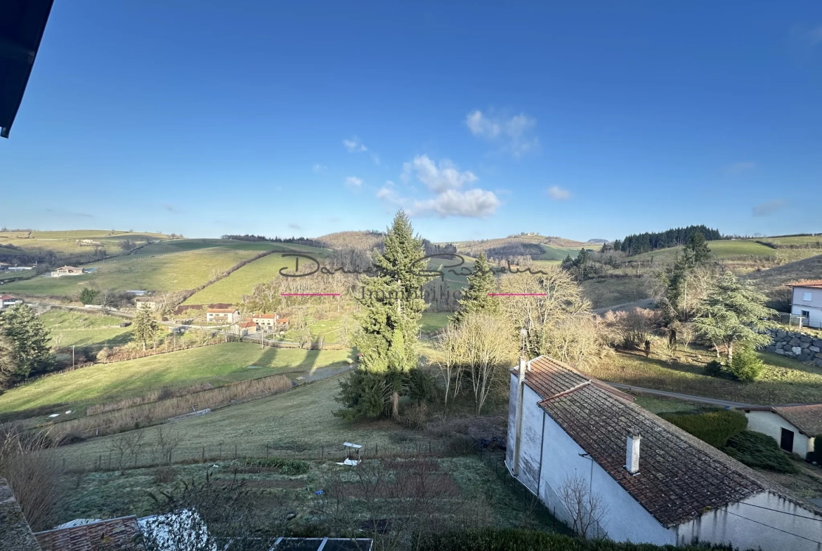 Maison de village avec jardin, garage et véranda à Sainte Colombe sur Gand 