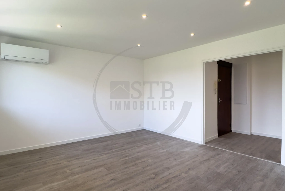 Appartement rénové de 61 m² à Valence avec balcon, garage et cave 
