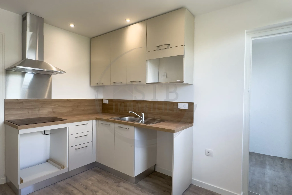 Appartement rénové de 61 m² à Valence avec balcon, garage et cave 