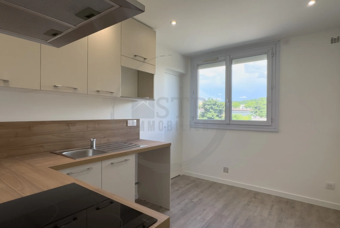 Appartement rénové de 61 m² à Valence avec balcon, garage et cave 