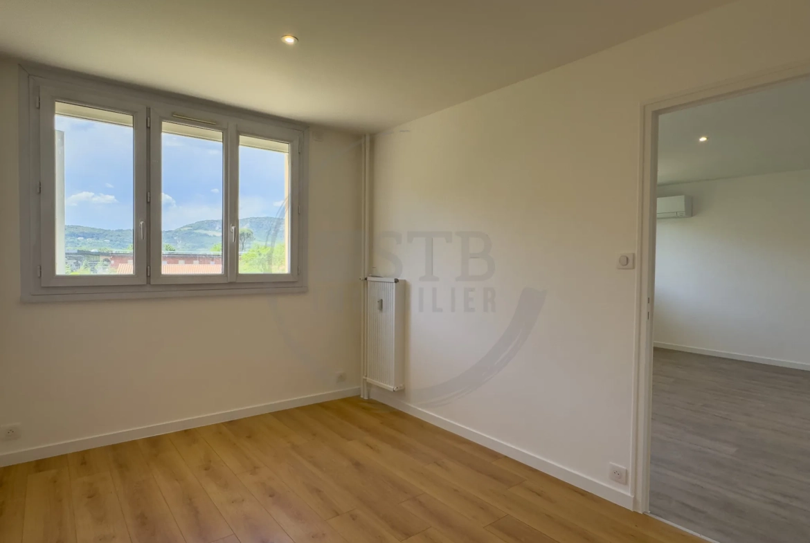 Appartement rénové de 61 m² à Valence avec balcon, garage et cave 