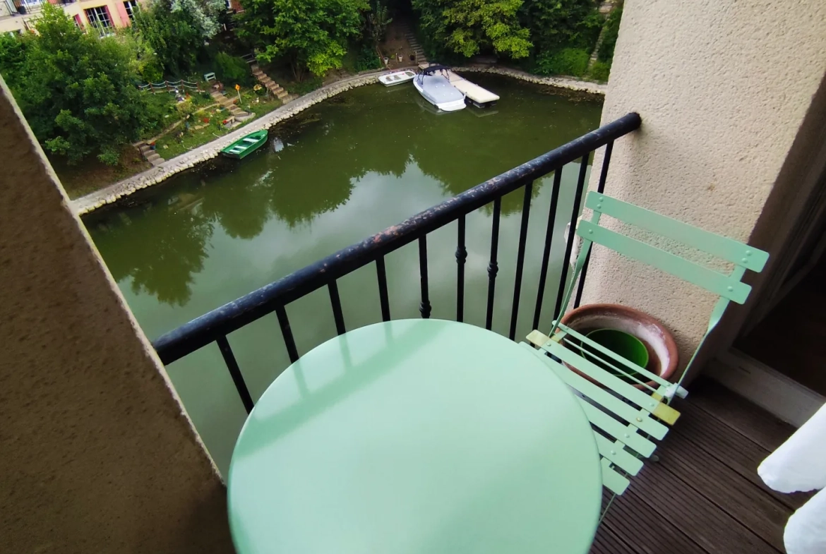 Appartement T2 avec terrasse à Cergy – Vue dégagée sur l'Oise et parking privé 