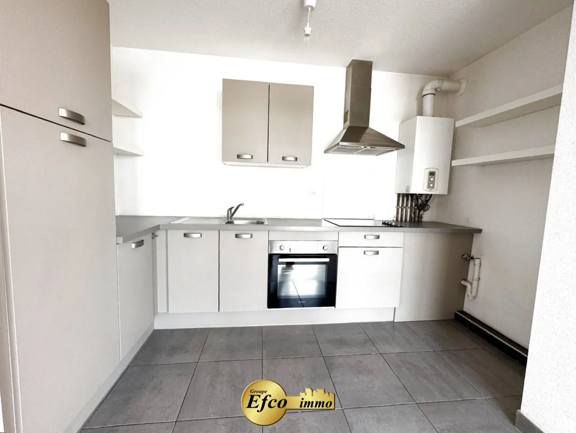 Appartement 2 pièces de 51,89 m² à Saint-Louis avec terrasse et parking 