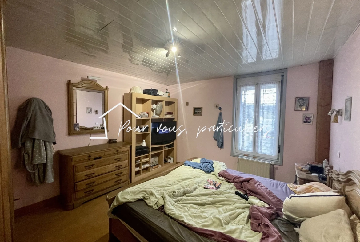 Immeuble de rapport à Raismes de 291m² avec appartements et local commercial 