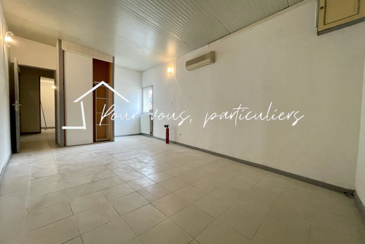 Immeuble de rapport à Raismes de 291m² avec appartements et local commercial 
