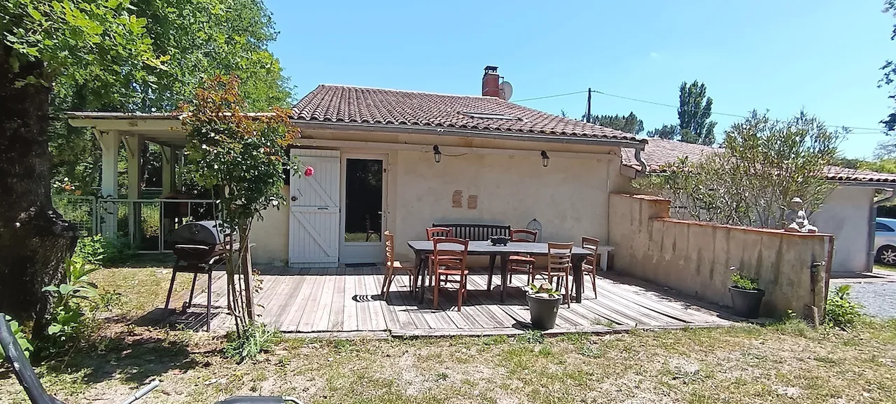 Maison en pierre de 136 m² avec jardin et dépendance à Leogeats 