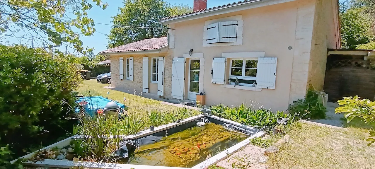 Maison en pierre de 136 m² avec jardin et dépendance à Leogeats 