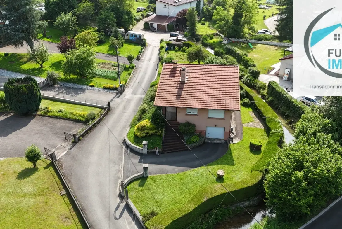 Maison traditionnelle F5 à Autechaux-Roide avec garage, sous-sol et terrain arboré 