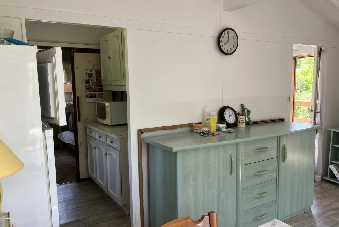 Bungalow en bois de 32 m² à Le Mazeau proche de la rivière - Idéal amoureux de la nature 