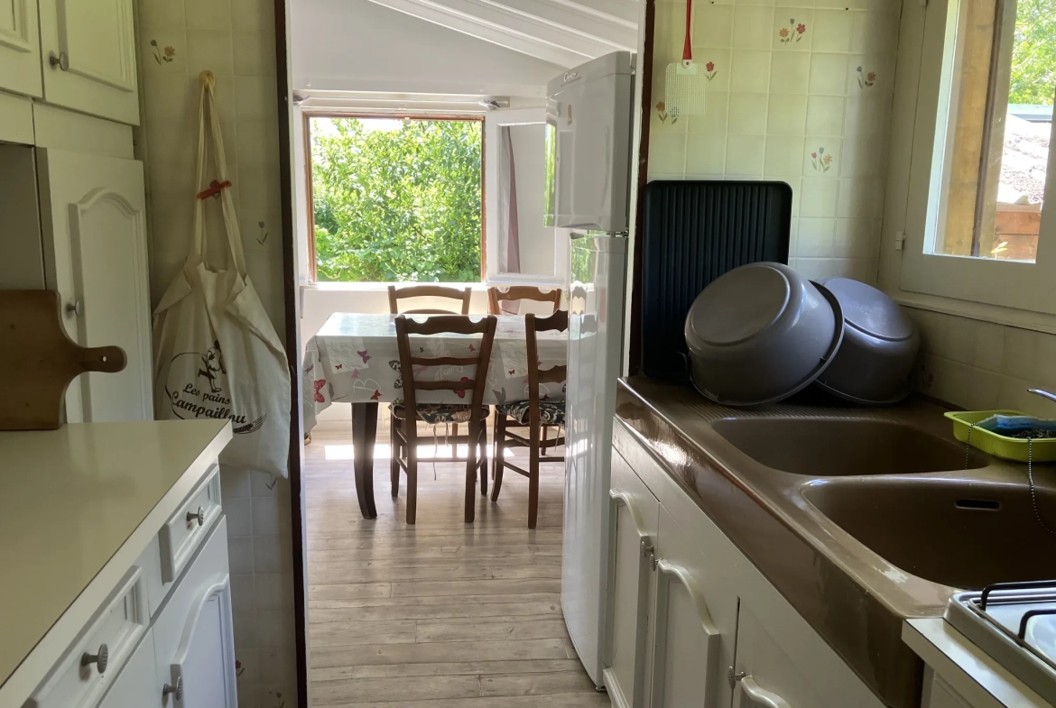 Bungalow en bois de 32 m² à Le Mazeau proche de la rivière - Idéal amoureux de la nature 