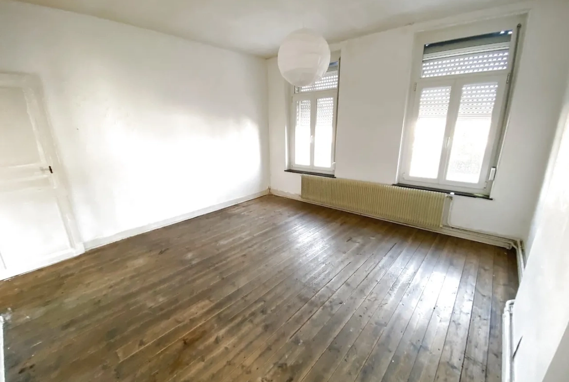 Maison semi-individuelle à Marpent avec jardin et garage - Opportunité à saisir 
