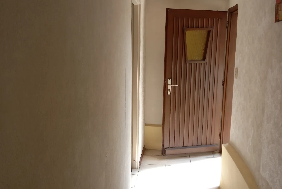 Maison de 166 m² à Manspach avec double logement et dépendance 